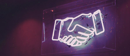 Neon Schild auf dem sich zwei Hände schütteln